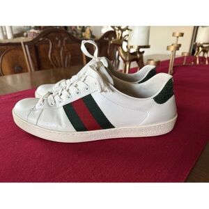 Gucci White Sneakers with Green and Red Stripes.